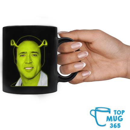 https://images.topmug365.com/2022/12/tZiP0rvT-shrek-and-nicolas-cage-face-mug-Mug-den.jpg